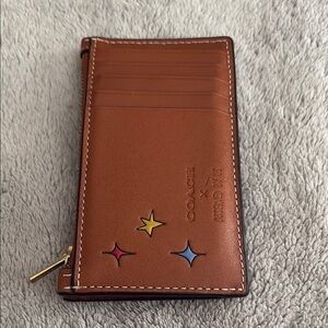 Coach x Observed By Us collab wallet